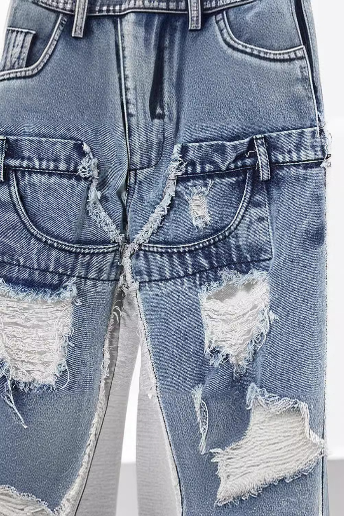 Reem DeconstructedTorn Jeans